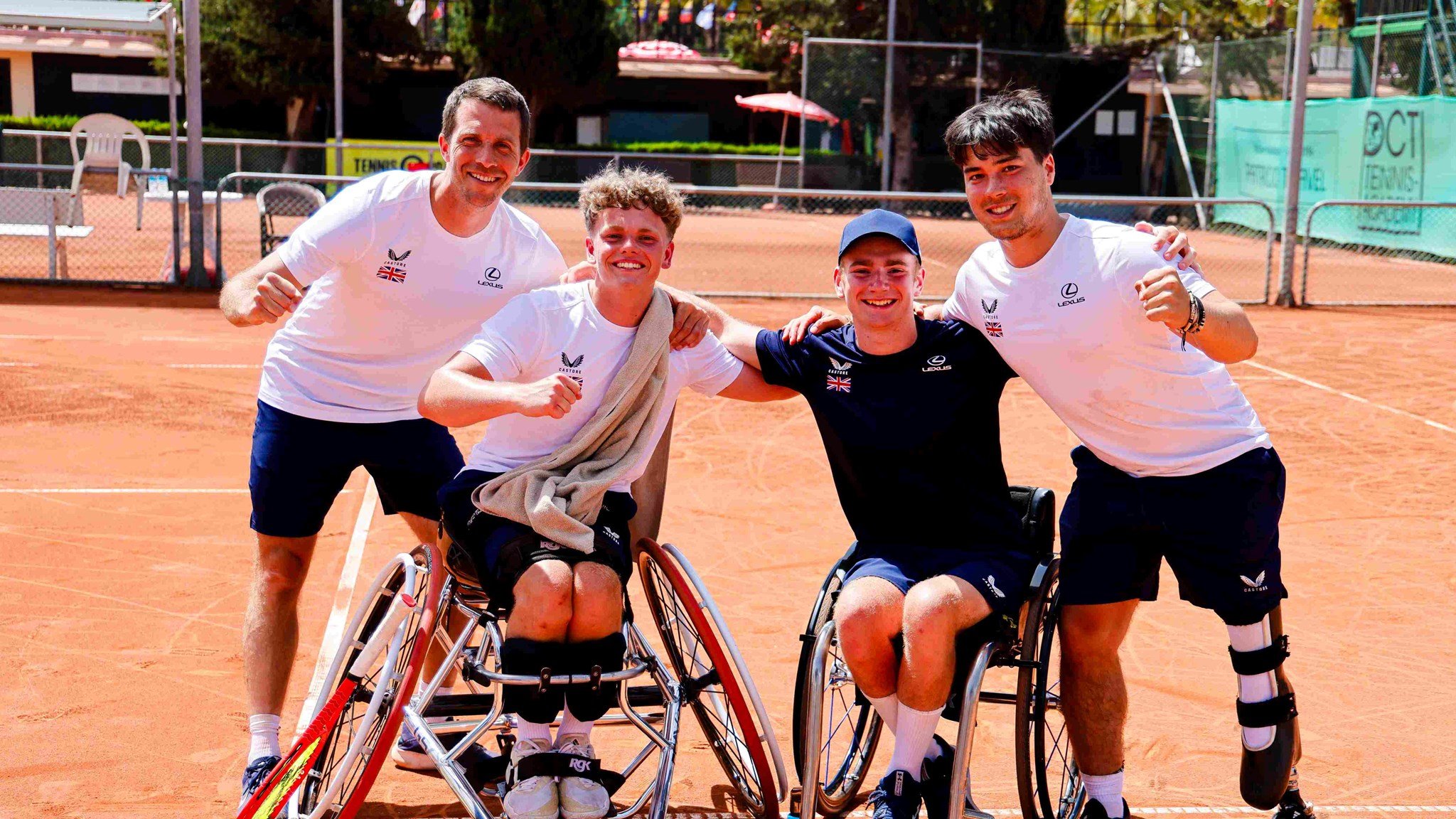 Wheelchair tennis players Ben Bartram, Andrew Penney and Dahnon Ward celebrating after winning bronze in the men's category at the World Team Cup