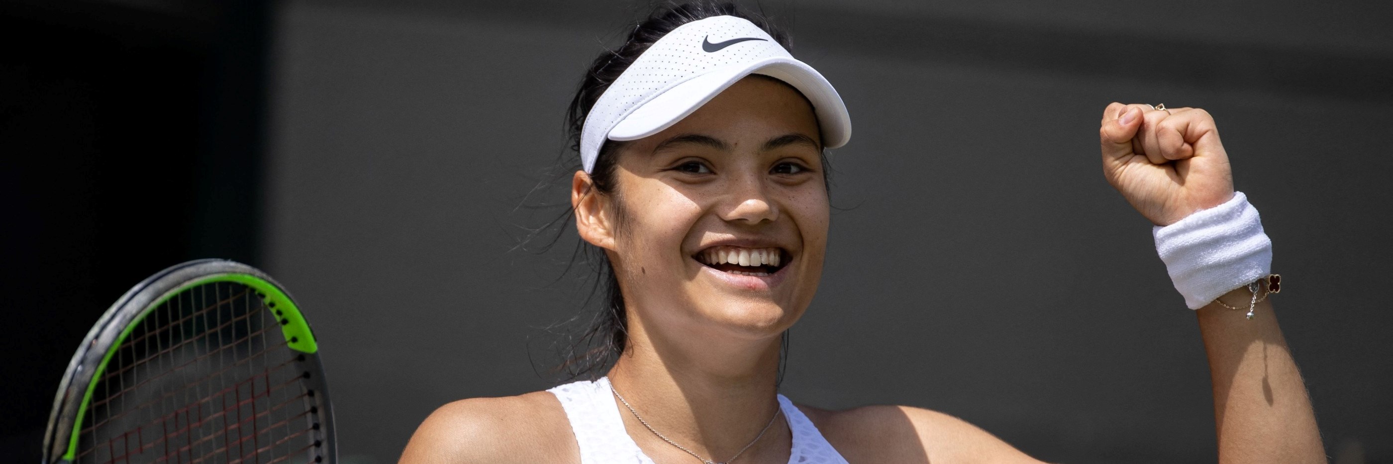 Emma Raducanu smiling at Wimbledon in 2021