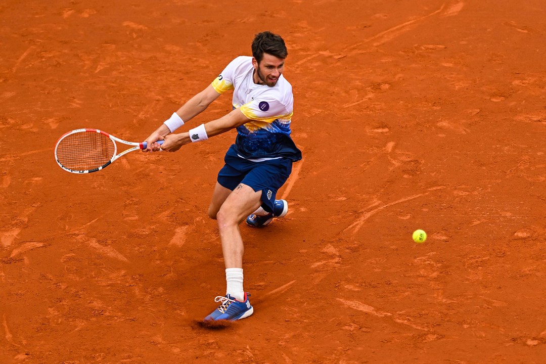 Cam Norrie sliding into a backhand at the Barcelona Open