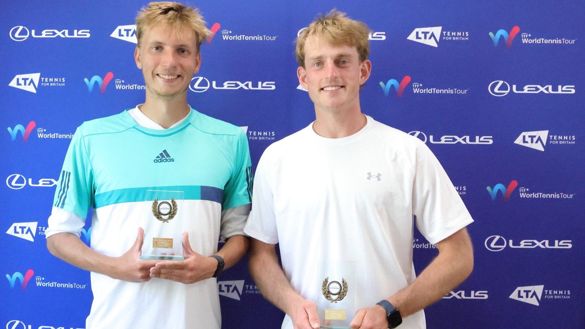 James MacKinlay and Liam Hignett holding their winners trophy at the Lexus British Pro Series Nottingham