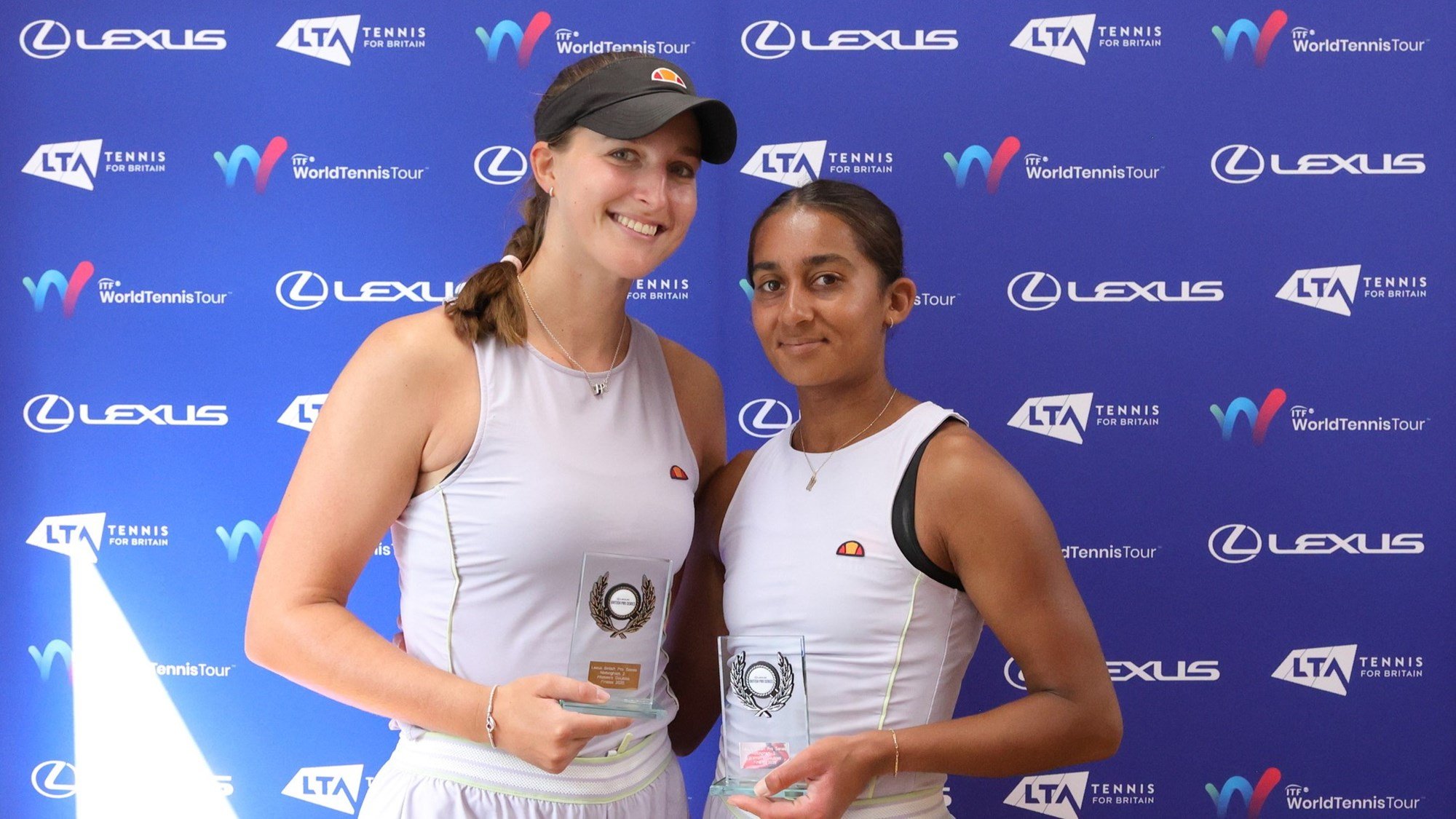 Holly Hutchinson and Naiktha Bains holding their runners-up trophies at the Lexus British Pro Series Nottingham