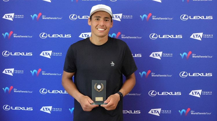 Charles Broom holding his men's singles trophy at the Lexus British Pro Series Nottingham