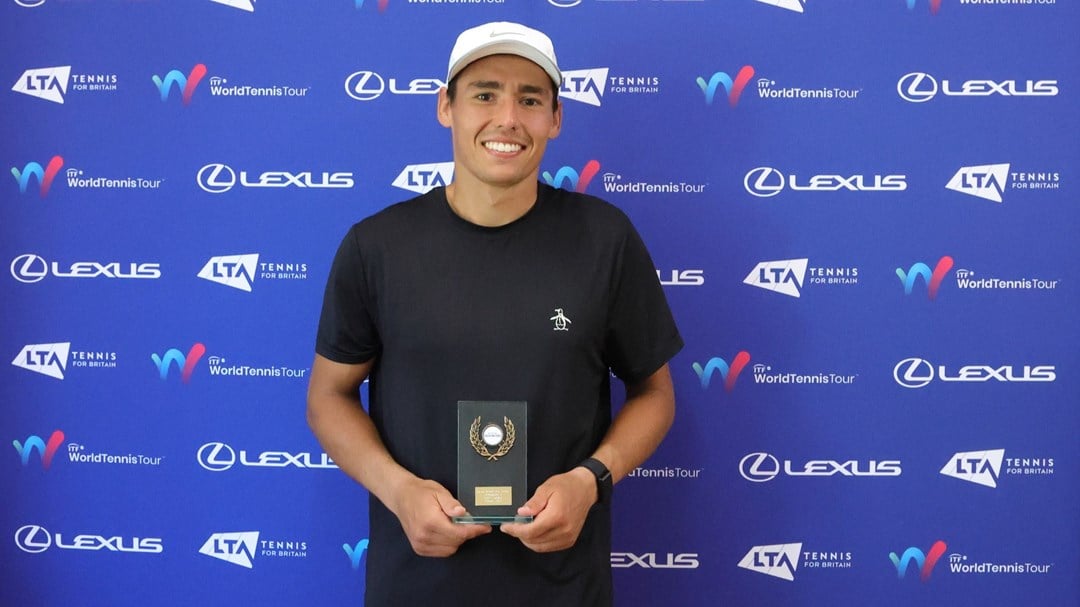 Charles Broom holding his men's singles trophy at the Lexus British Pro Series Nottingham