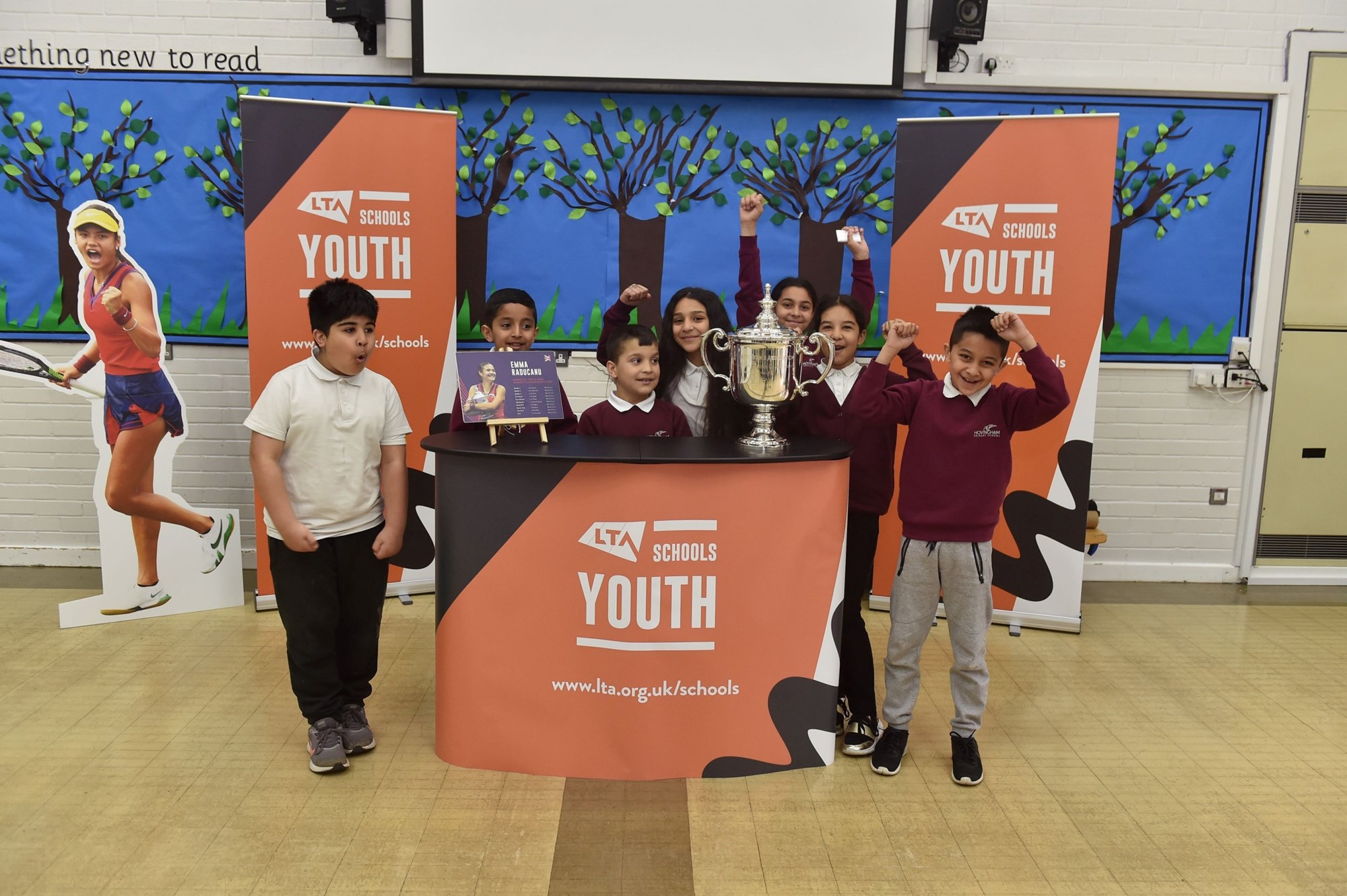 Hovingham Primary School students pictured with Emma Raducanu's US Open Trophy