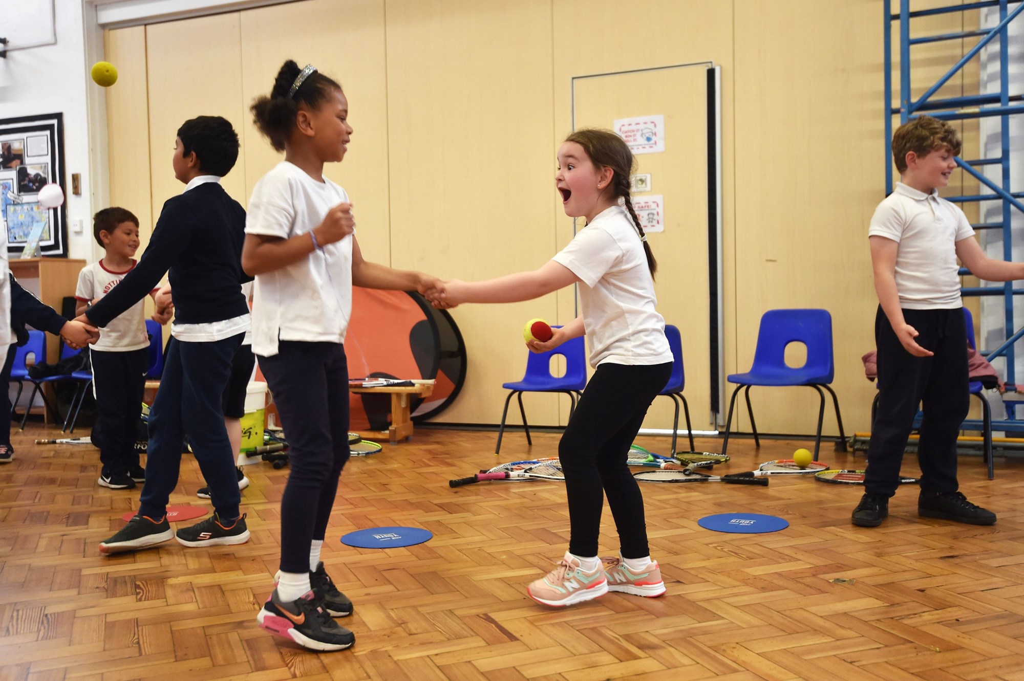 Pupils of Haydn Primary School pictured enjoying their LTA Youth coaching session