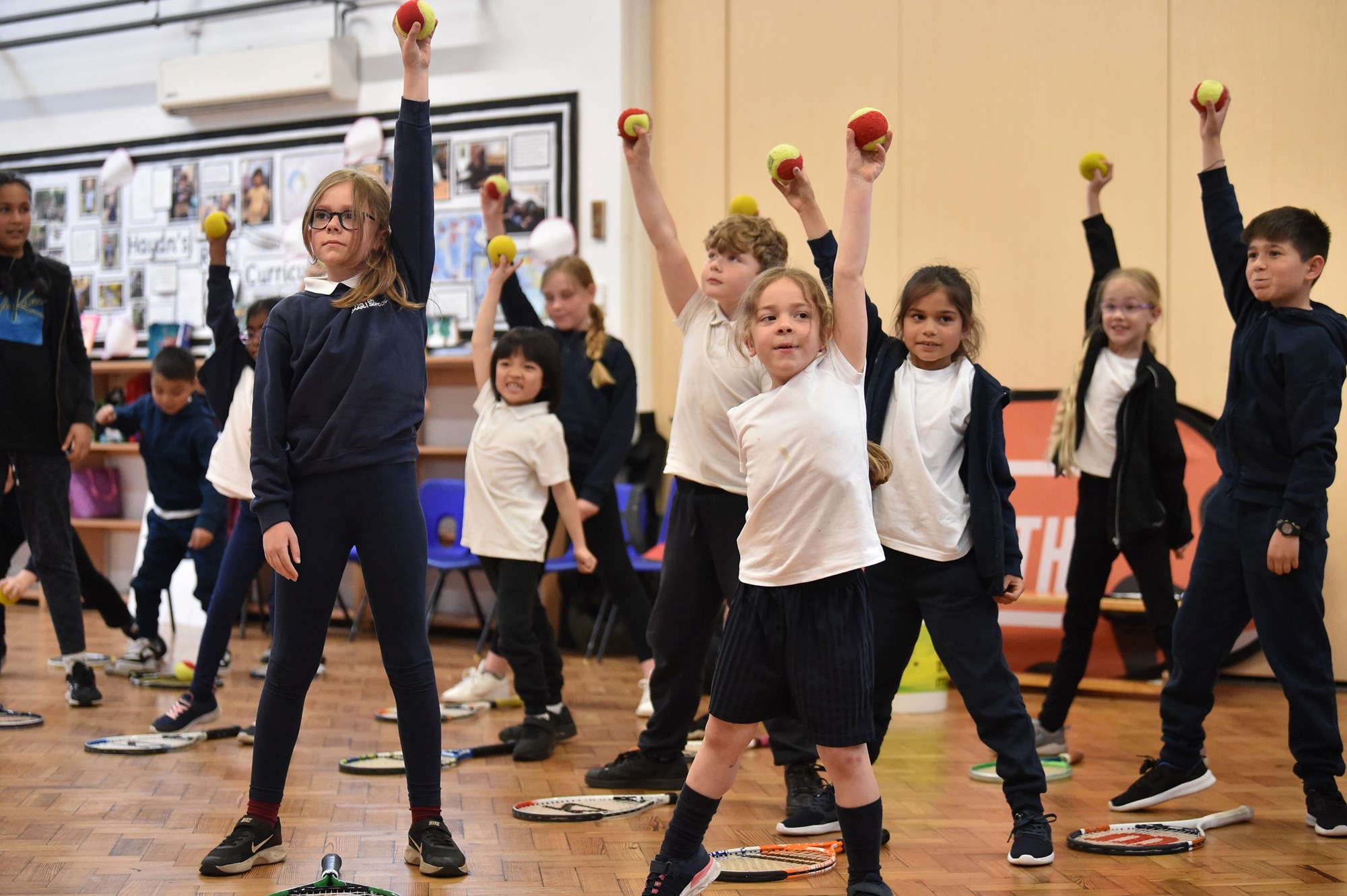 Pupils participating in some tennis activities during Emma Raducanu's US Open Trophy Tour 