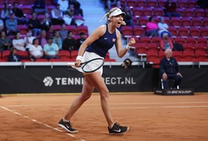 Katie Boulter lets out a roar in celebration as she beats Tatjana Maria at the Billie Jean King Cup