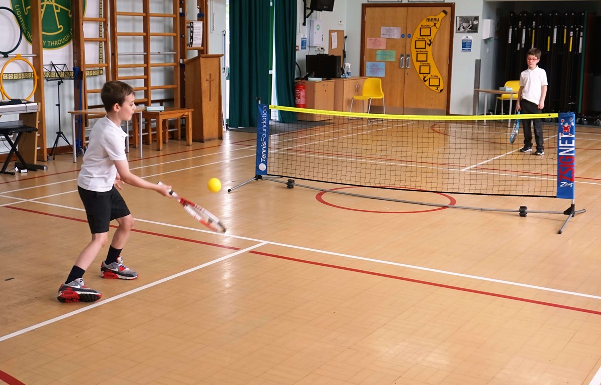 Pupils at Deal Parochial Primary School playing tennis 
