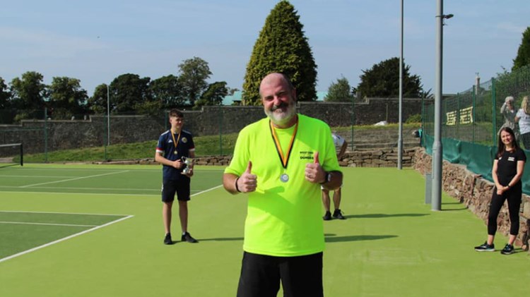 fabian haut on court for volunteer week