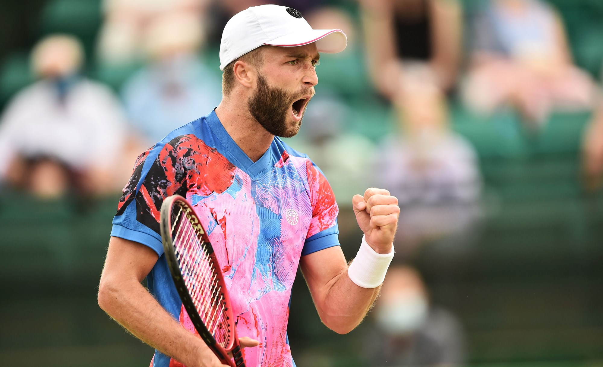 Liam Broady celebrates as he wins a point on day five of the Nottingham Open 2021