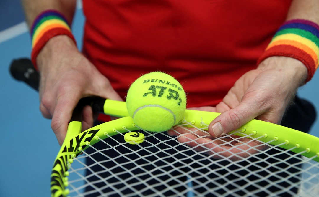 Tennis player wearing Pride wristbands