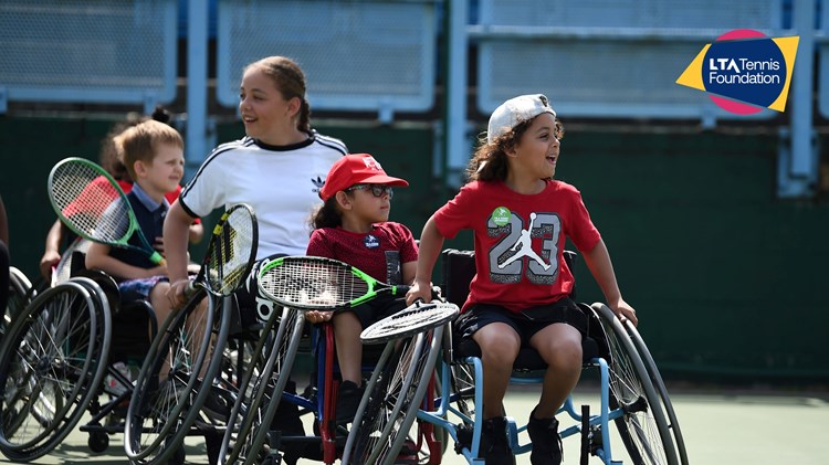 Young wheelchair tennis players heading onto court