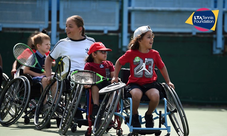 Young wheelchair tennis players heading onto court