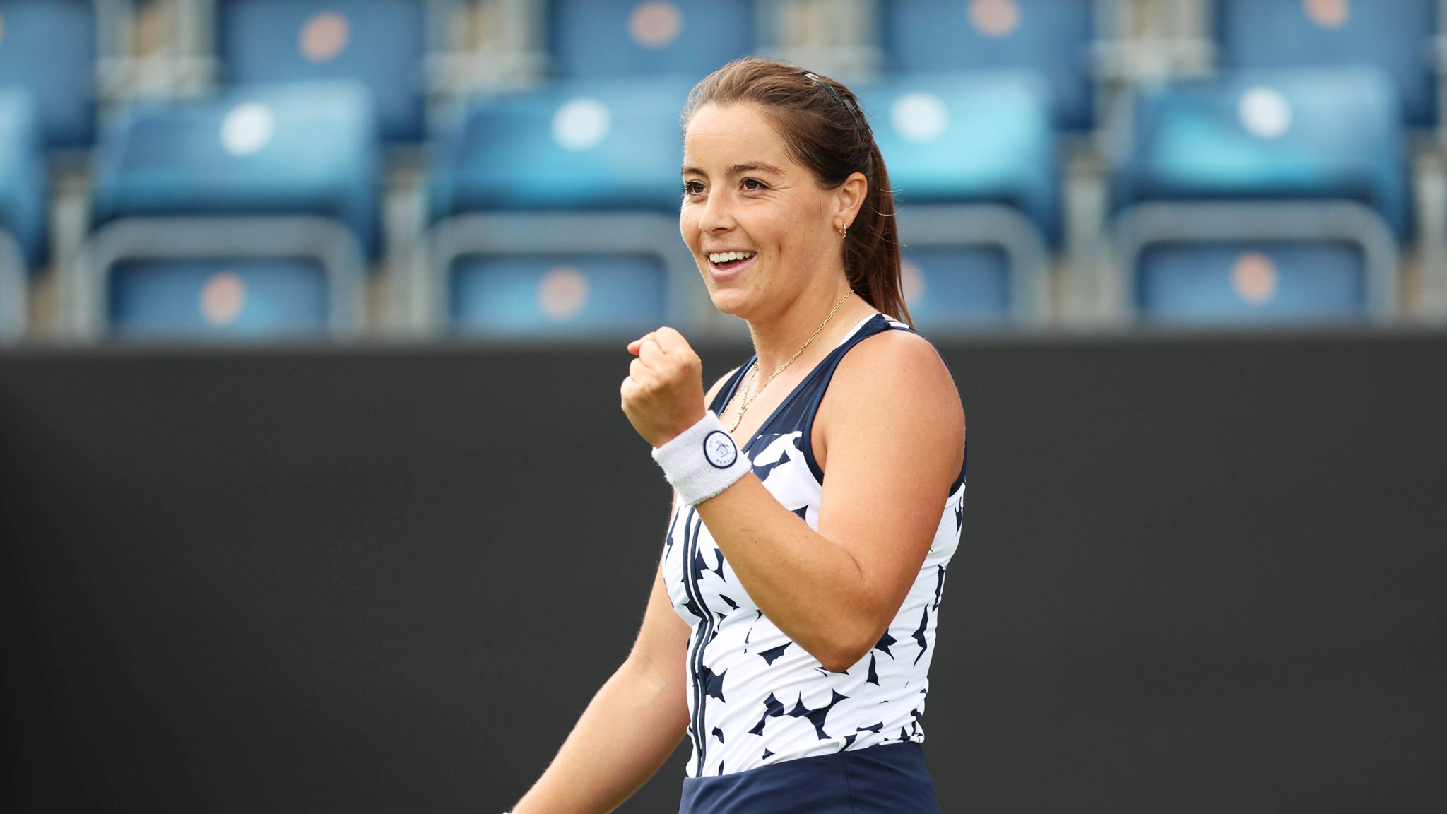 Jodie Burrage smiles and gives a fist pump after coming through the first round at the Lexus Birmingham Open
