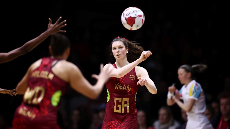 Sophie Drakeford Lewis playing netball for England