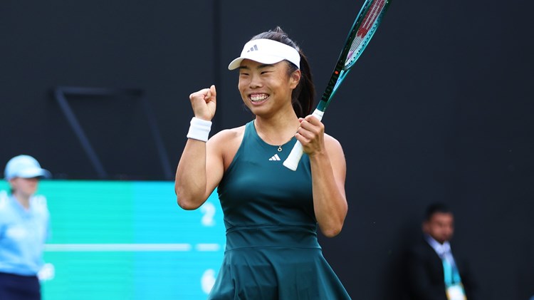 Mimi Xu smiles in celebration after a win at the Lexus Birmingham Open