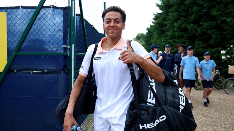 Paul Jubb smiles and gives a thumbs up to the cameras after a first round with at Lexus Surbiton Trophy