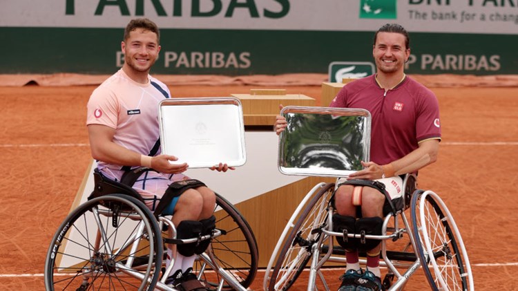 tennis scotland roland garros two players on clay court receiving awards