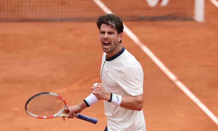 Cam Norrie celebrates beating Daniil Medvedev at Roland Garros 2025