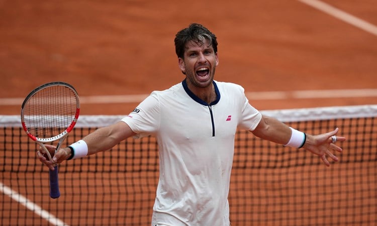 Cam Norrie celebrates beating Daniil Medvedev at Roland Garros 2025