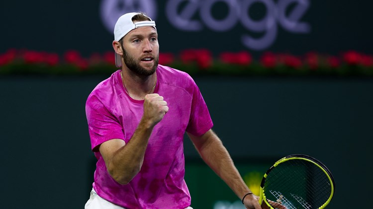 Jack Sock celebrates winning a point at the Miami Open 2022