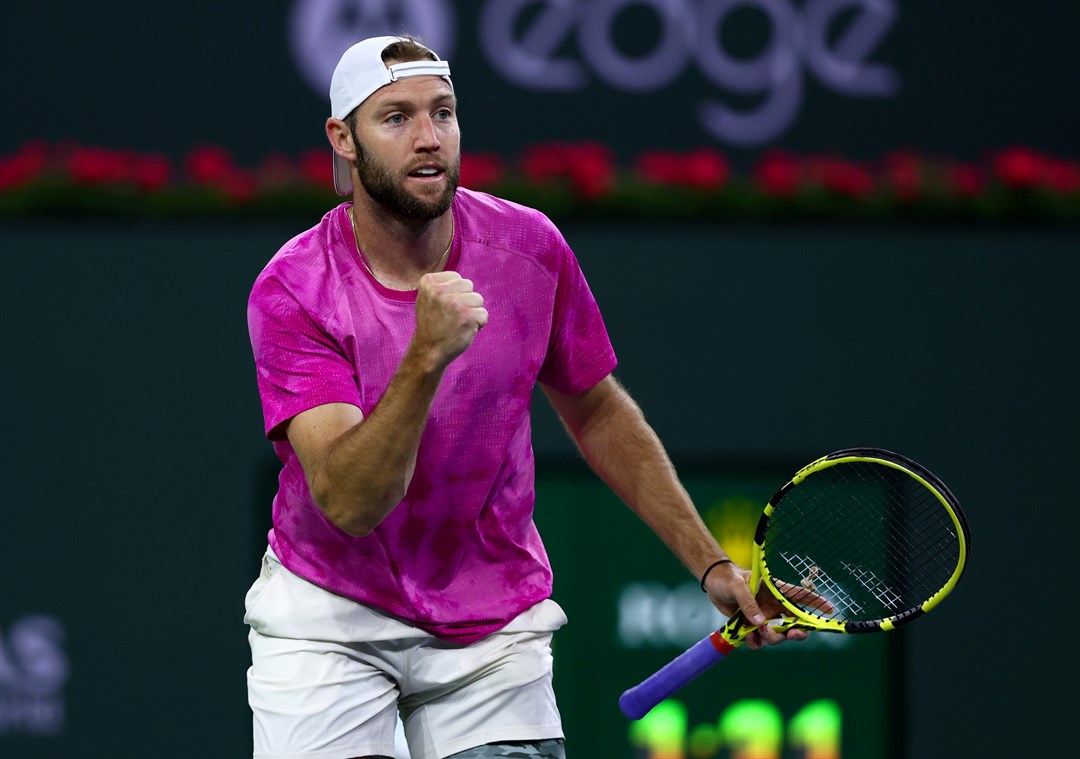 Jack Sock celebrates winning a point at the Miami Open 2022
