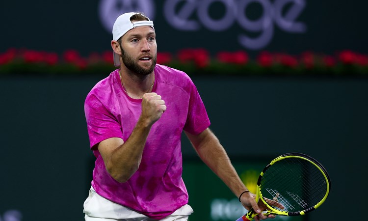 Jack Sock celebrates winning a point at the Miami Open 2022