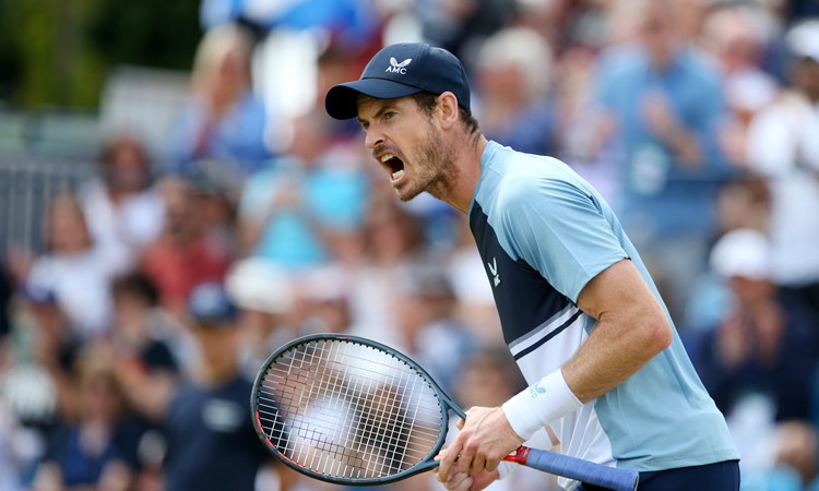 Andy Murray celebrates after taking the first set during his second round match of the 2022 Surbiton Trophy Tennis Tournament