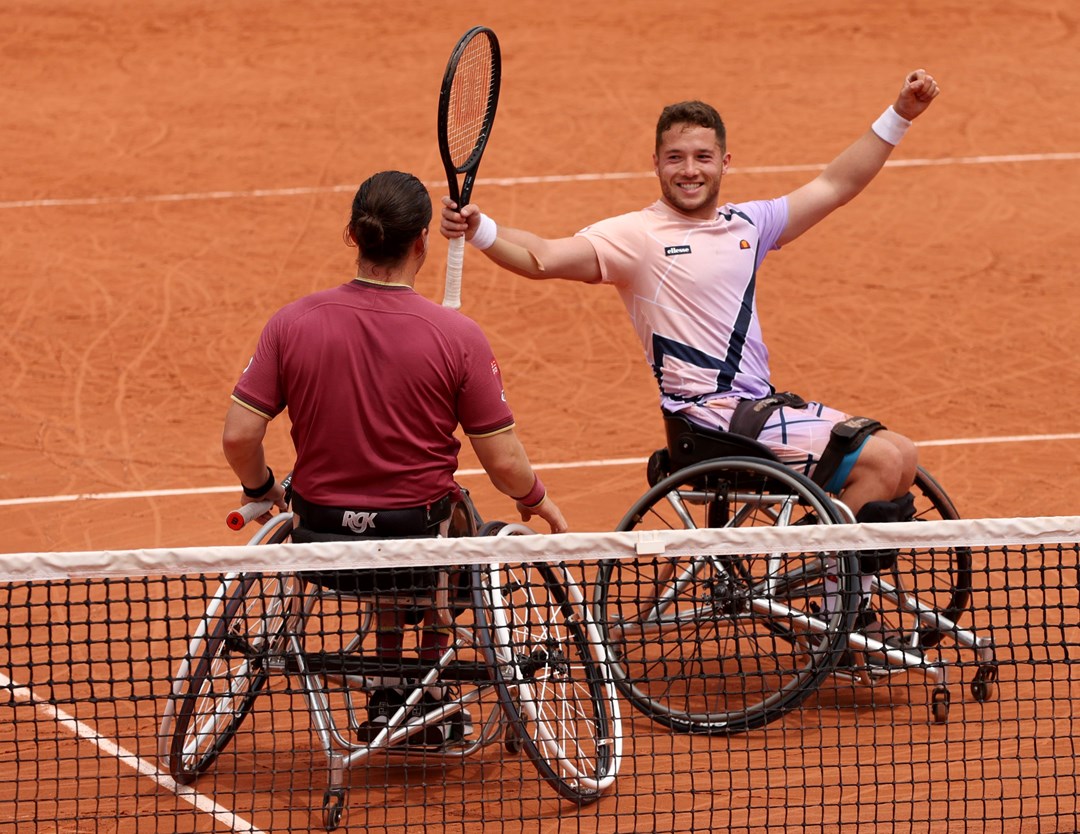 Alfie Hewett and Gordon Reid celebrate winning their third successive French Open