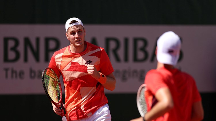 Henry Patten gives a fist pump at the French Open in 2023