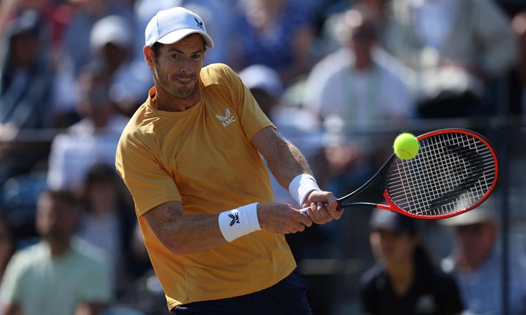 Andy Murray hitting a backhand at the Lexus Surbiton Trophy