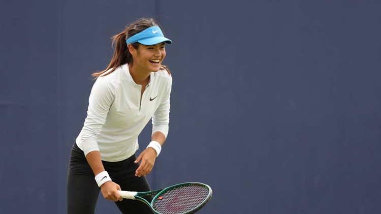 Emma Raducanu laughing while practicing at the HSBC Championships
