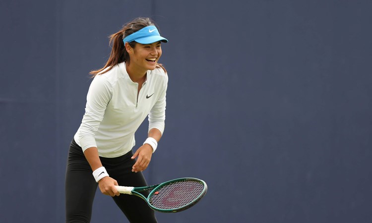 Emma Raducanu laughing while practicing at the HSBC Championships