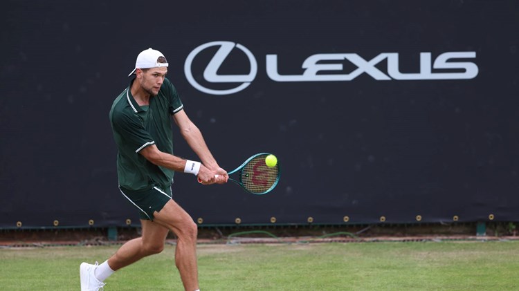 Otto Virtanen hitting a backhand at the Lexus Birmingham Open