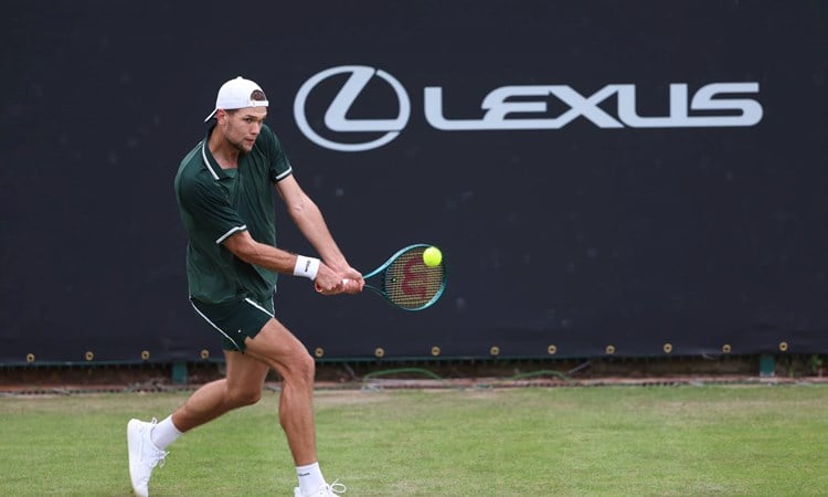 Otto Virtanen hitting a backhand at the Lexus Birmingham Open