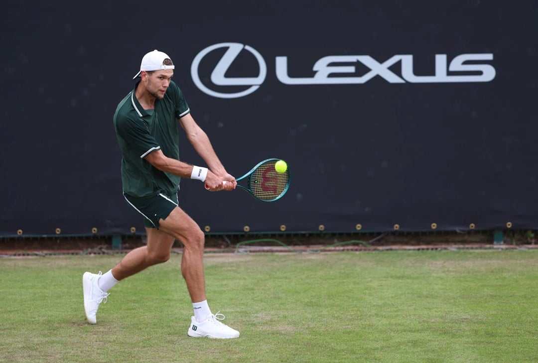 Otto Virtanen hitting a backhand at the Lexus Birmingham Open