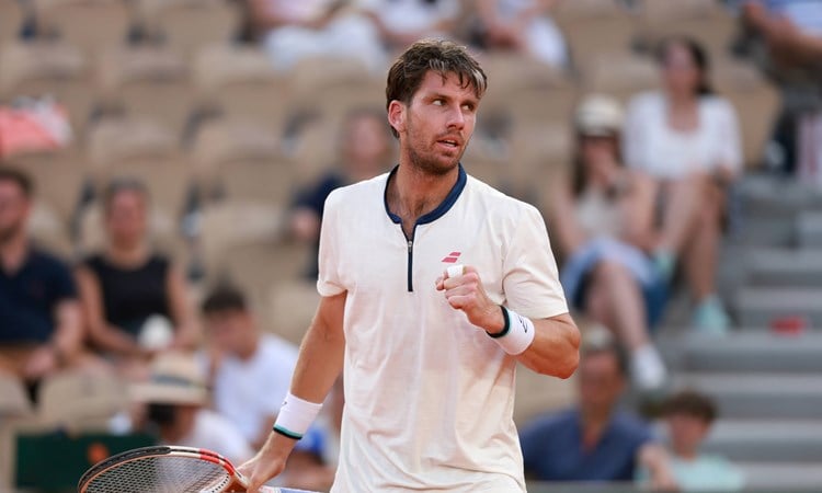 Cam Norrie gives a fist pump in his third round victory over Jacob Fearnley at Roland Garros