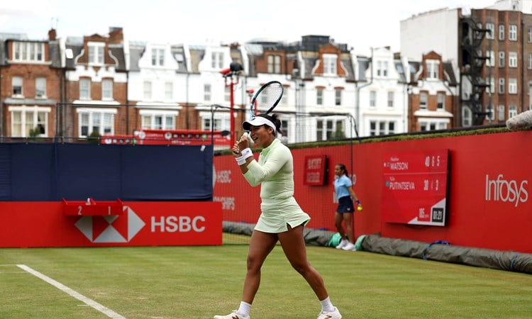 Heather Watson celebrates beating Yulia Putintseva at the HSBC Championships