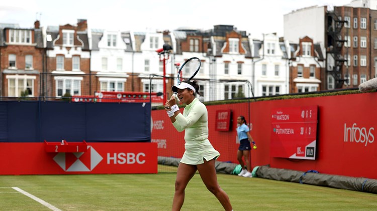 Heather Watson celebrates beating Yulia Putintseva at the HSBC Championships