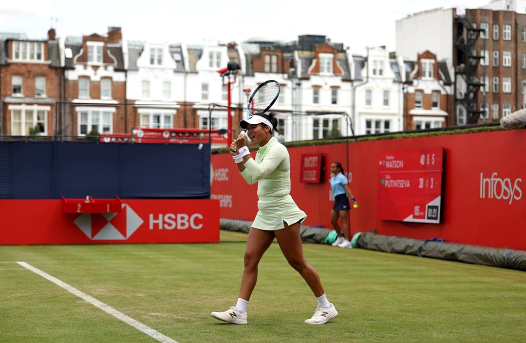 Heather Watson celebrates beating Yulia Putintseva at the HSBC Championships