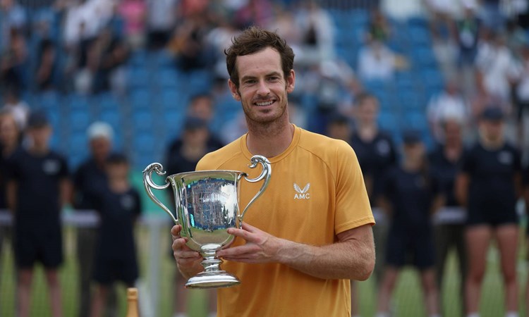 Andy Murray holding the 2023 Lexus Surbiton Trophy title