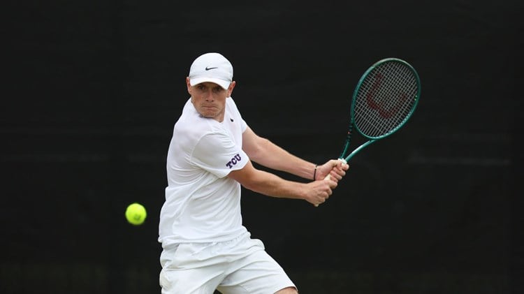 Jack Pinnington Jones about to hit the ball with a backhand