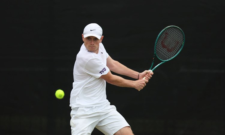 Jack Pinnington Jones about to hit the ball with a backhand