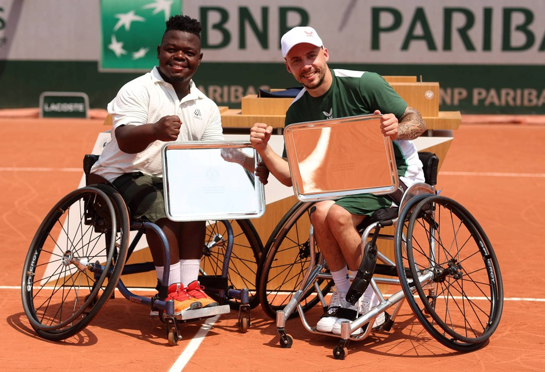 Andy Lapthorne and Donald Ramphadi with the 2023 French Open quad doubles title