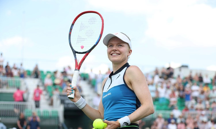 Harriet Dart smiling on court after a second round win at the Rothesay Open Nottingham
