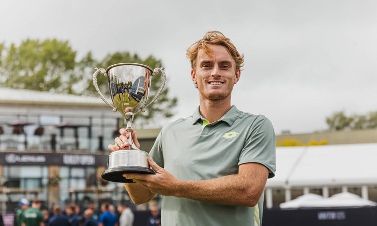 Tristan Schoolkate holding the Lexus Ilkley Open trophy