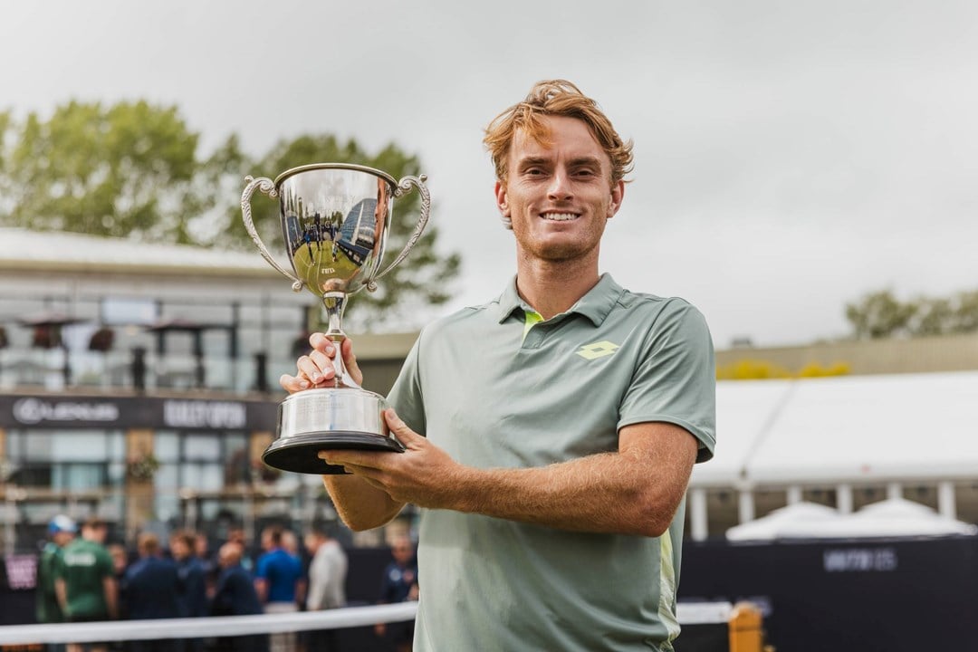 Tristan Schoolkate holding the Lexus Ilkley Open trophy