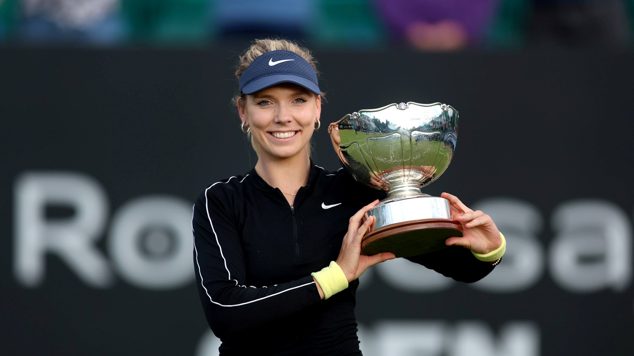 Katie Boulter holding the Elena Baltacha Trophy at the Rothesay Open Nottingham