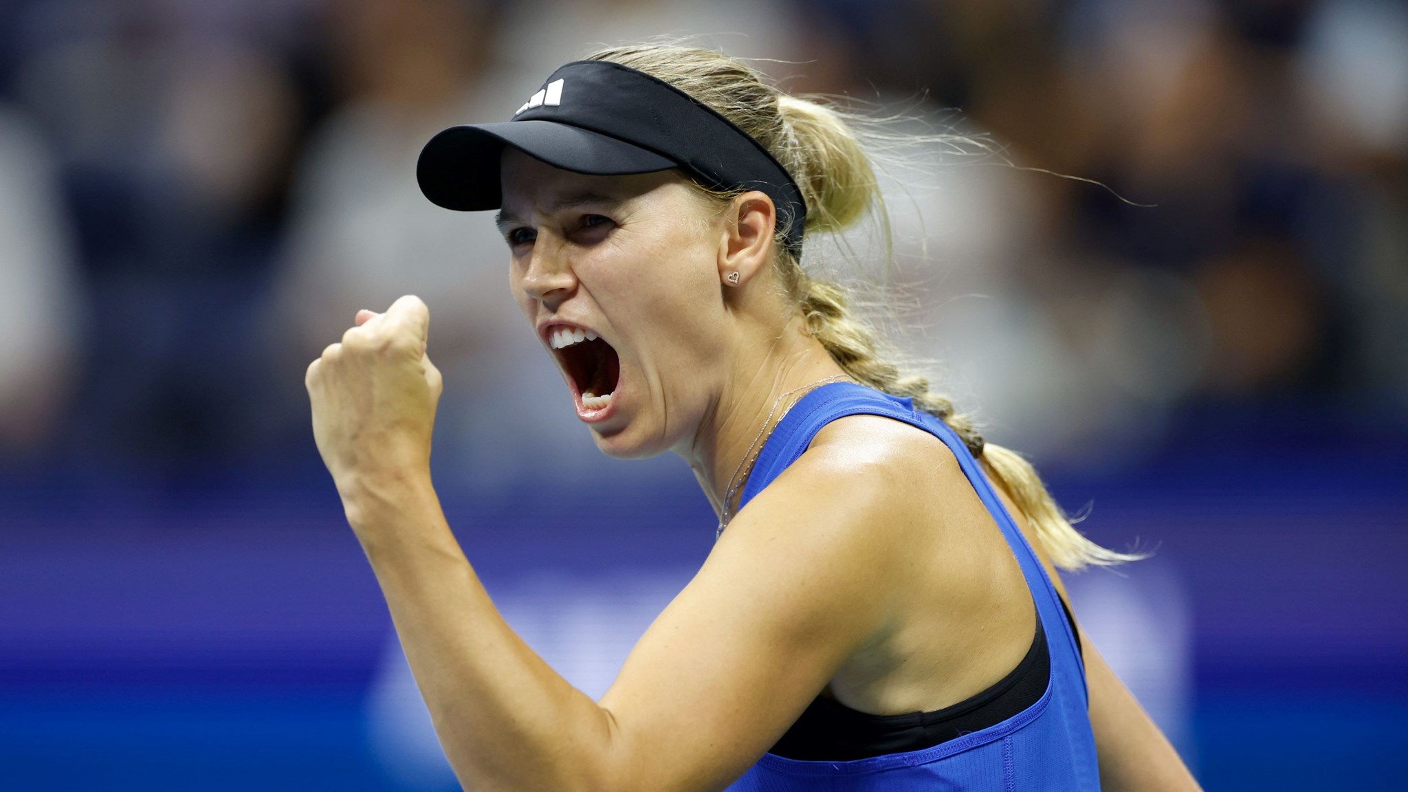 Caroline Wozniacki of Denmark celebrates winning the first set against Petra Kvitova of Czech Republic during their Women's Singles Second Round match on Day Three of the 2023 US Open at the USTA Billie Jean King National Tennis Center on August 30, 2023 in the Flushing neighborhood of the Queens borough of New York City. 