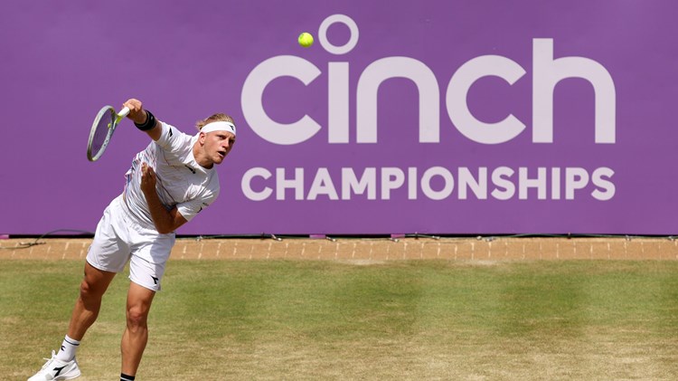 Davidovich Fokina hitting a serve at Queen's